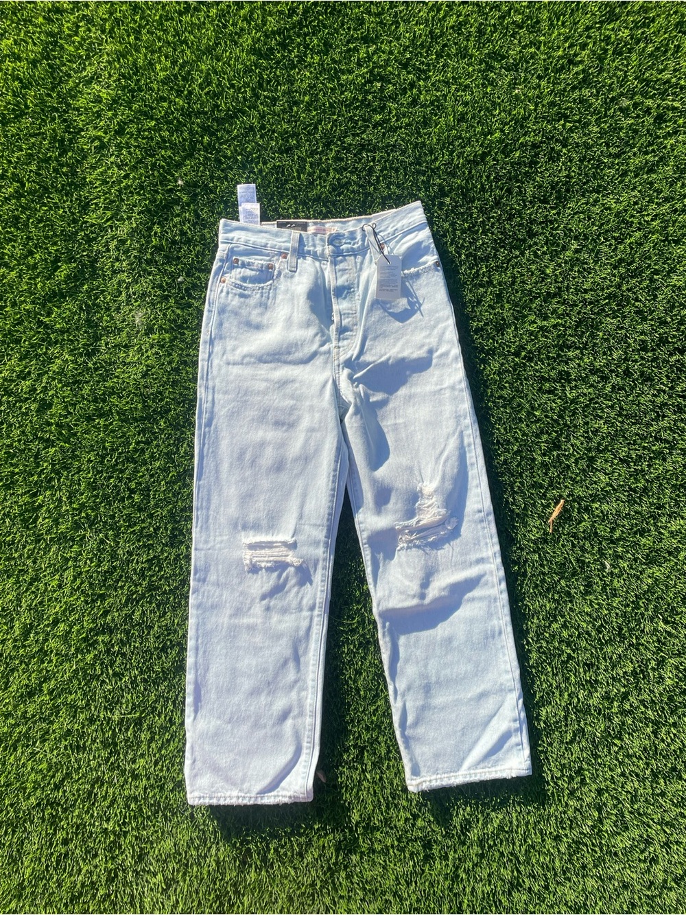 Levi's Light Wash Wide Leg Jeans with Knee Distress